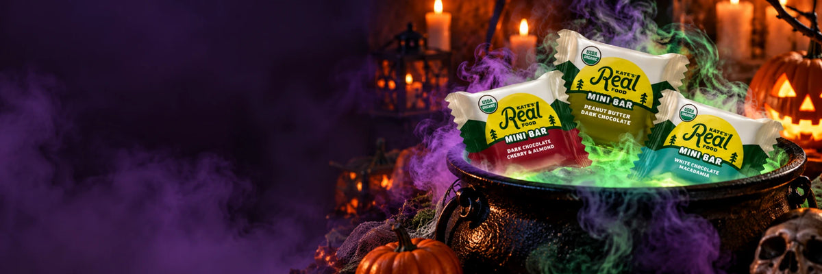 Kate's Real Food mini bars in a glowing Halloween cauldron